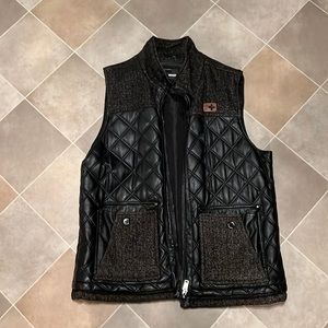 I’m selling a nice roc-A-wear vest black leather